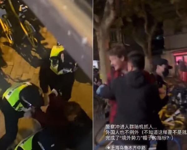 에드 로런스 BBC 기자가 27일(현지시간) 상하이에서 시위를 취재하던 중 수갑이 채워진 채 당국에 의해 연행되고 있다. [유튜브·트위터 캡처]
